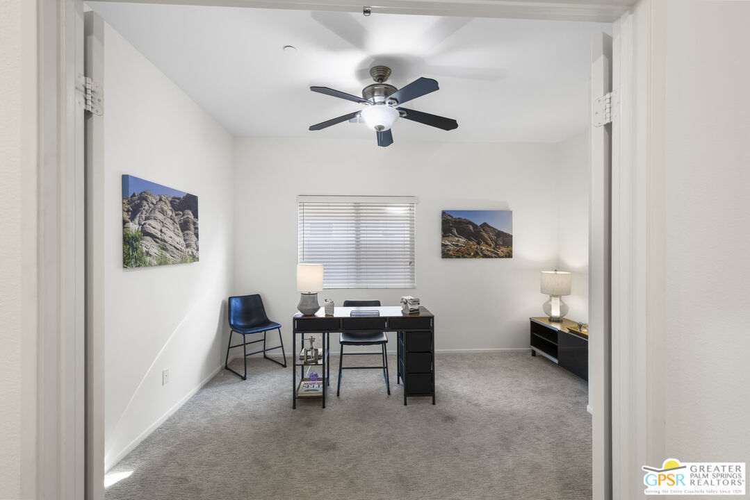 1264 Oro Ridge Palm Springs, CA 92262 - Photo 25 of 38 a view of a workspace with furniture and a window