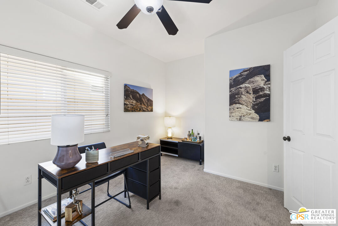 1264 Oro Ridge Palm Springs, CA 92262 - Photo 26 of 38 a living room with furniture and window