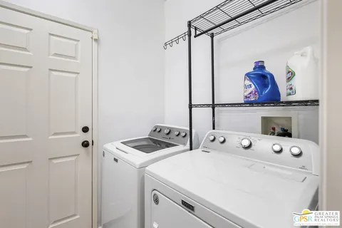 a backyard of a house with seating space