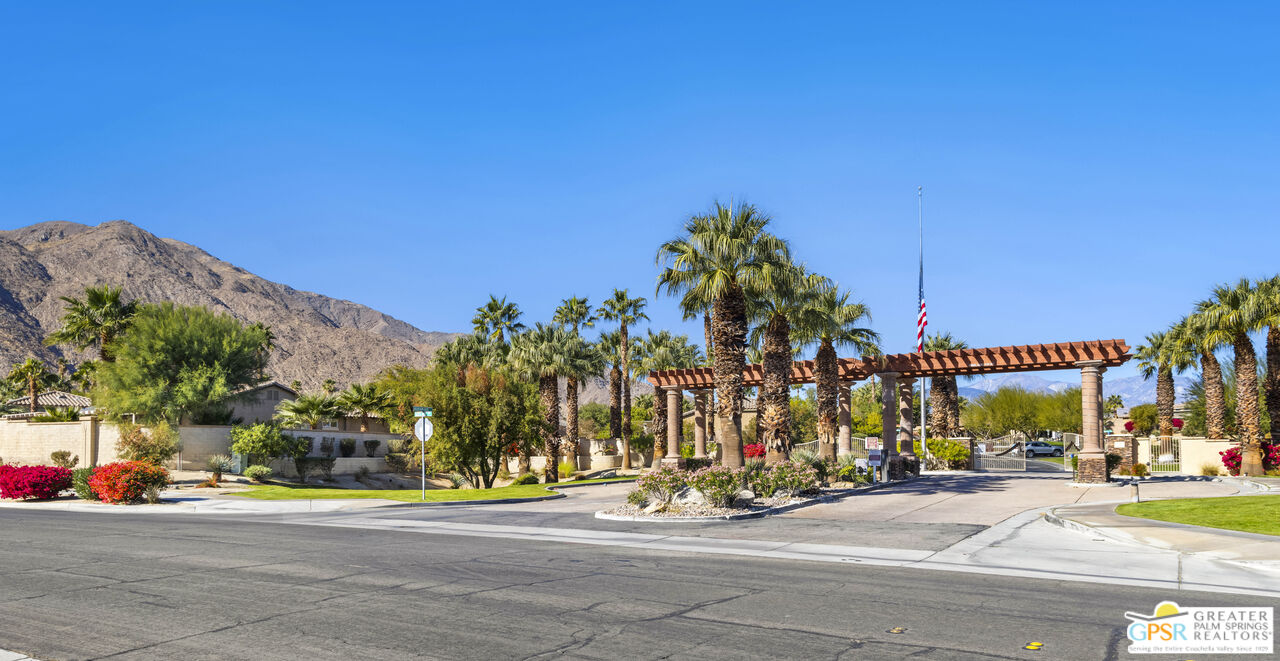 1264 Oro Ridge Palm Springs, CA 92262 - Photo 31 of 38 a view of a street with a building in the background