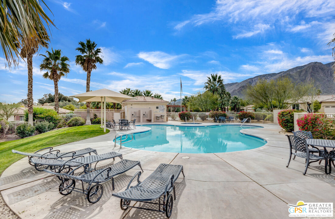 1264 Oro Ridge Palm Springs, CA 92262 - Photo 34 of 38 a view of a backyard with sitting area
