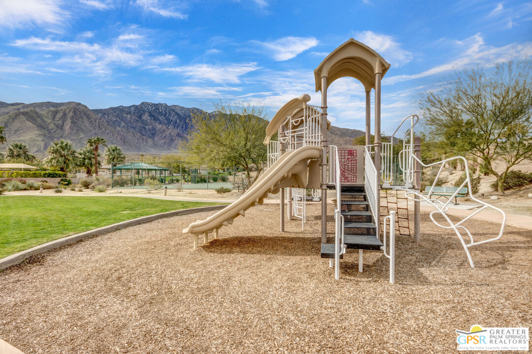 1264 Oro Ridge Palm Springs, CA 92262 - Photo 37 of 38 a view of a garden with a slide