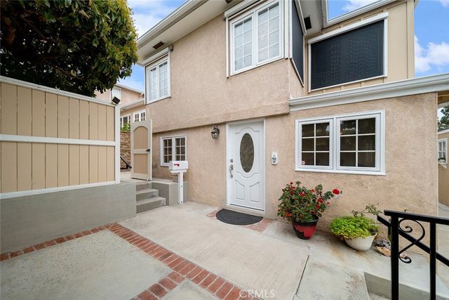 a house view with a outdoor space