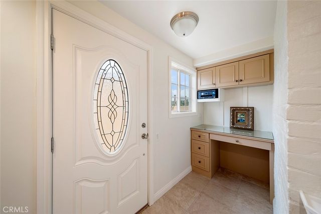 a view of a kitchen with a sink dryer and washer