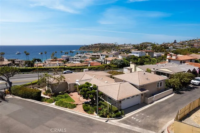 an aerial view of a house with a garden