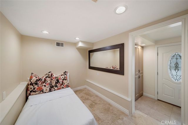 a view of a livingroom with shelves