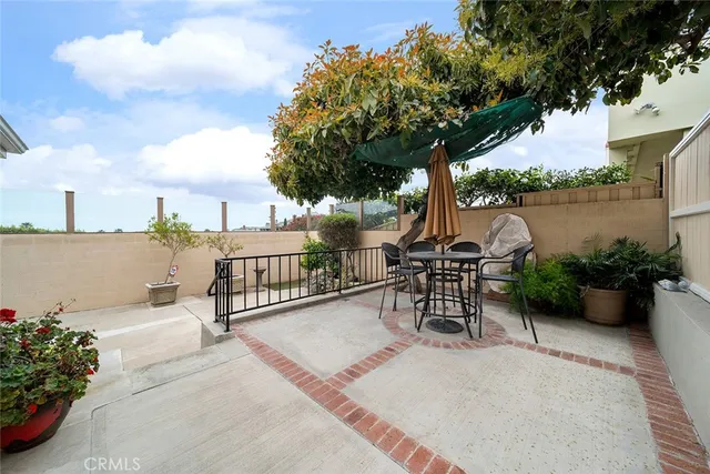 a view of a terrace with sitting area