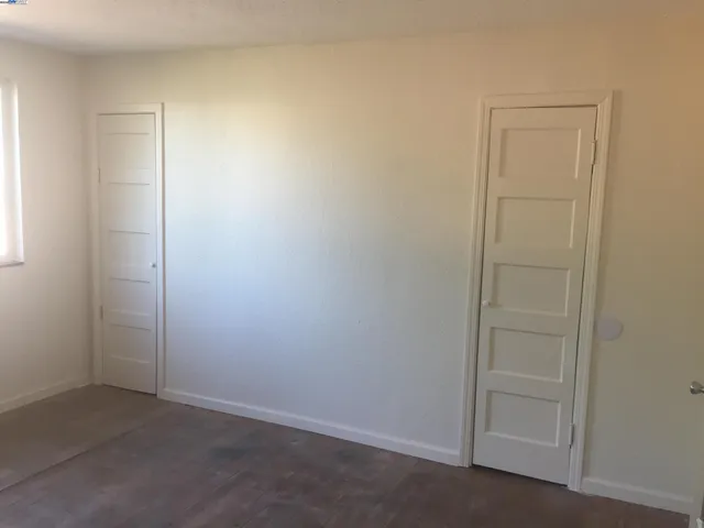 an empty room with closet