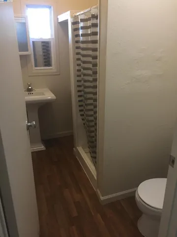 a bathroom with a toilet and a sink