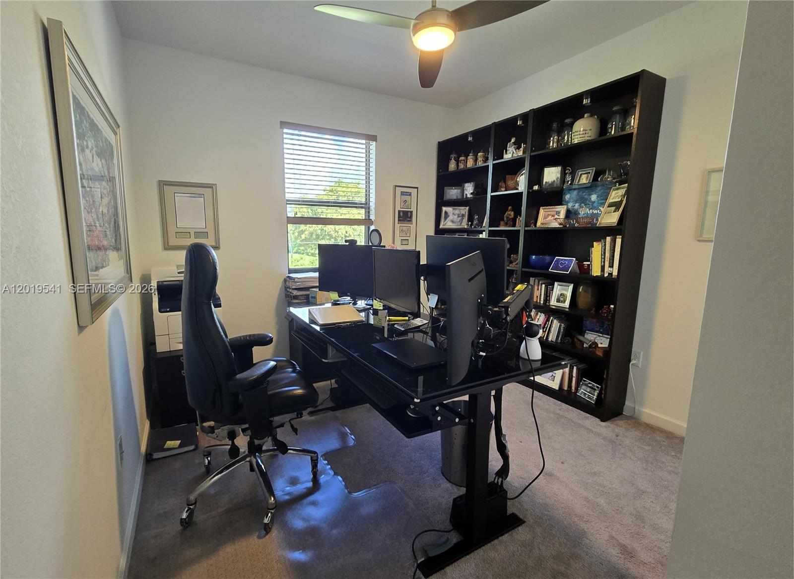 24400 Southwest 119th Place Homestead, FL 33032 - Photo 21 of 22 a view of a workspace with furniture