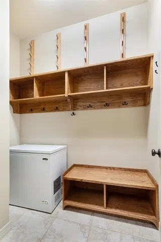 a view of a kitchen from the hallway