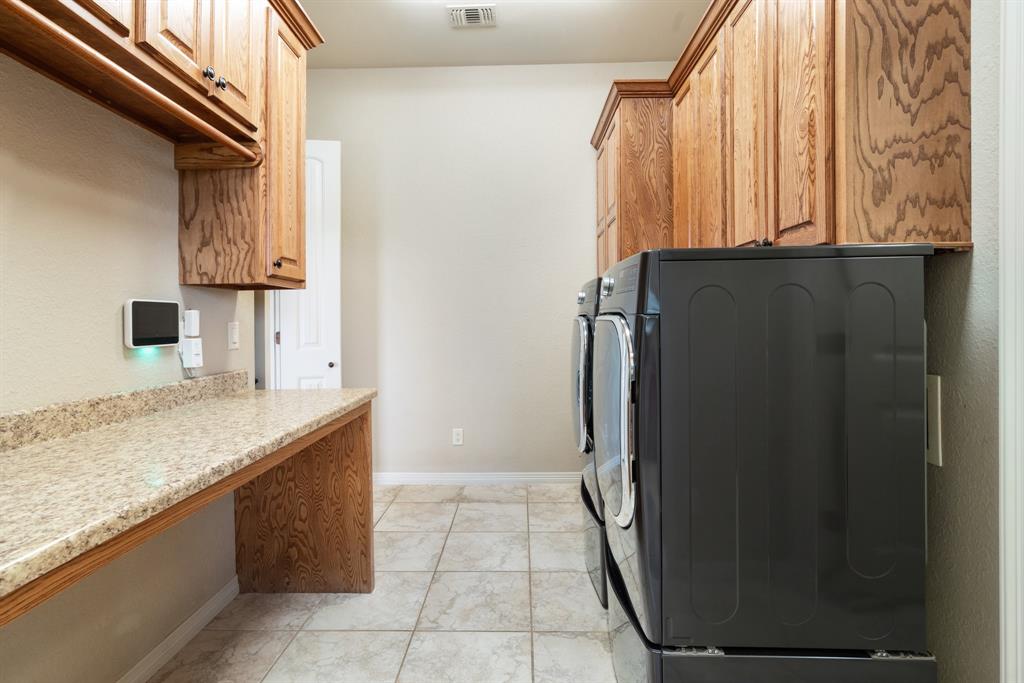 5500 Farm Road 195 Paris, TX 75462 - Photo 16 of 40 a view of a kitchen from the hallway