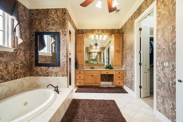 a bathroom with a tub shower and sink