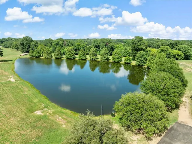 a view of a lake with a city