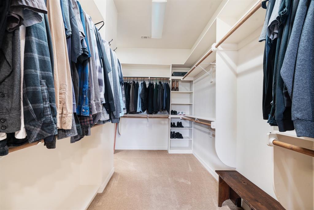 5500 Farm Road 195 Paris, TX 75462 - Photo 21 of 40 a view of walk in closet with clothes and shoes