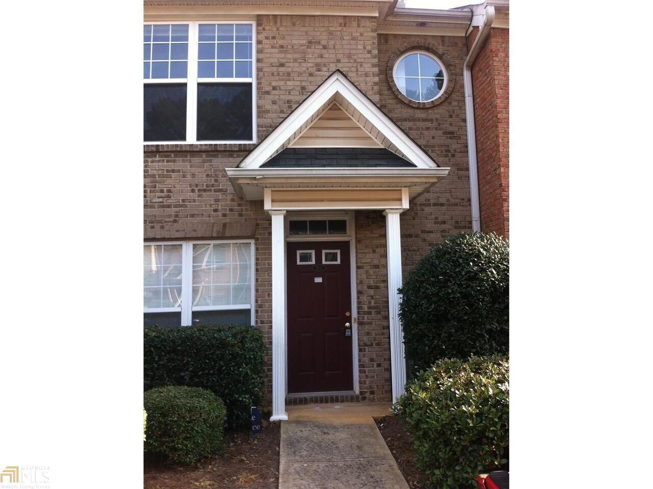 3811 Austin Park Lane Decatur, GA 30032 - Photo 1 of 1 a front view of a house with garden