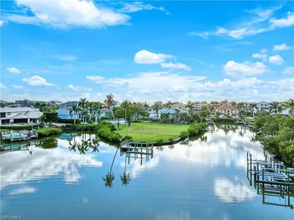 a view of a lake with a yard