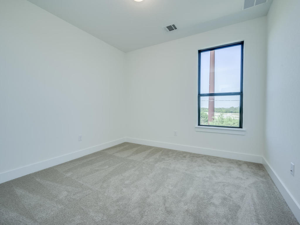 12327 Maypole Bend Austin, TX 78717 - Photo 27 of 30 an empty room with windows
