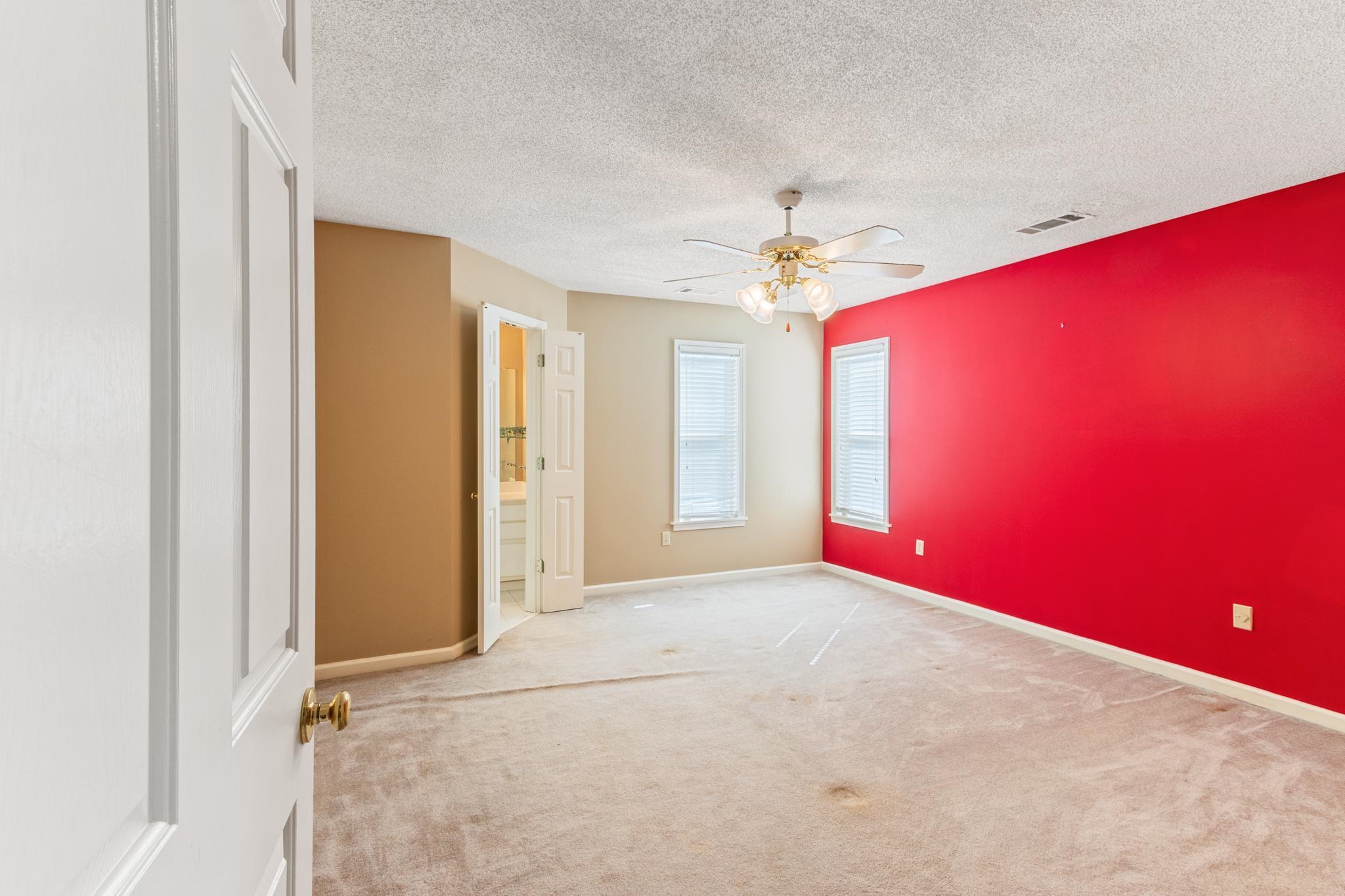 380 Woodbridge Road Somerville, TN 38068 - Photo 19 of 30 Empty room with carpet, ceiling fan, and a textured ceiling