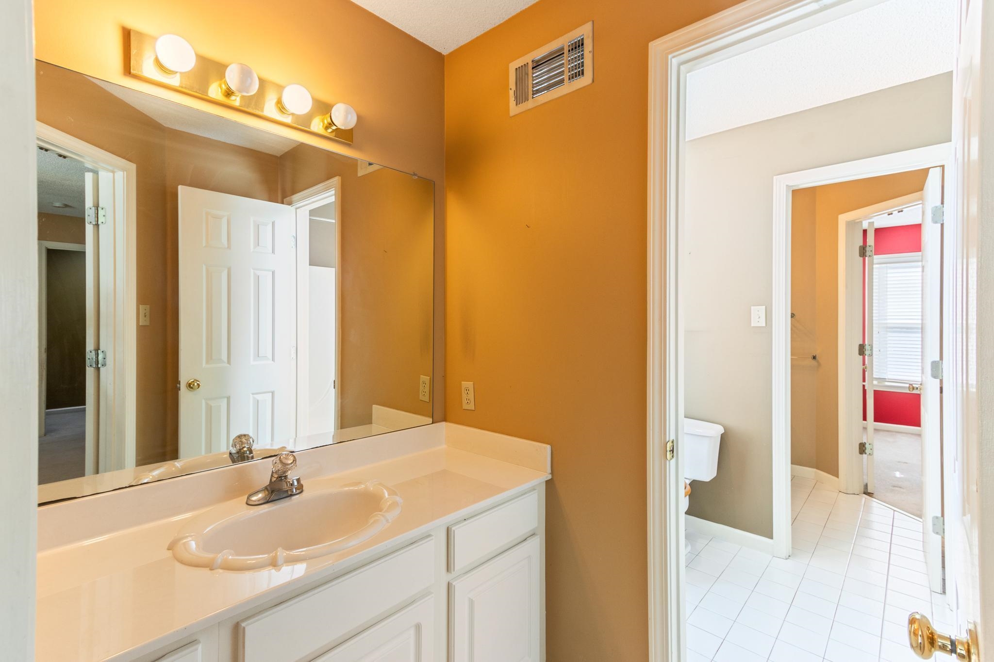 380 Woodbridge Road Somerville, TN 38068 - Photo 20 of 30 Bedroom 4 & 5 have their own vanity with shared shower area.