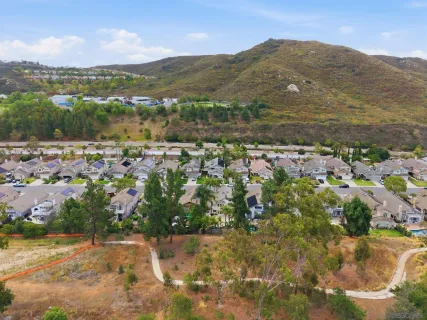 an aerial view of lake and residential houses