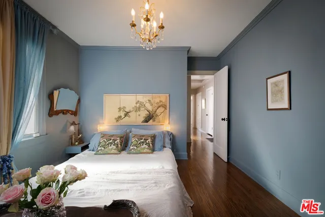 a living room with furniture fireplace and flat screen tv