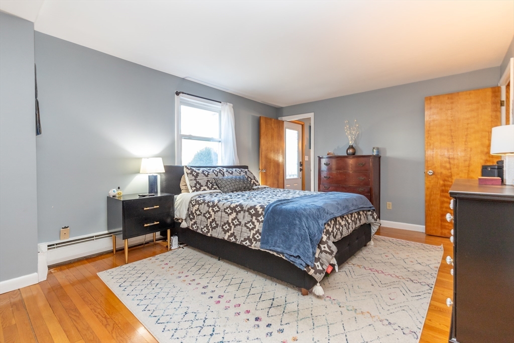 375 Andover Road Billerica, MA 01821 - Photo 20 of 32 a bedroom with a bed and window