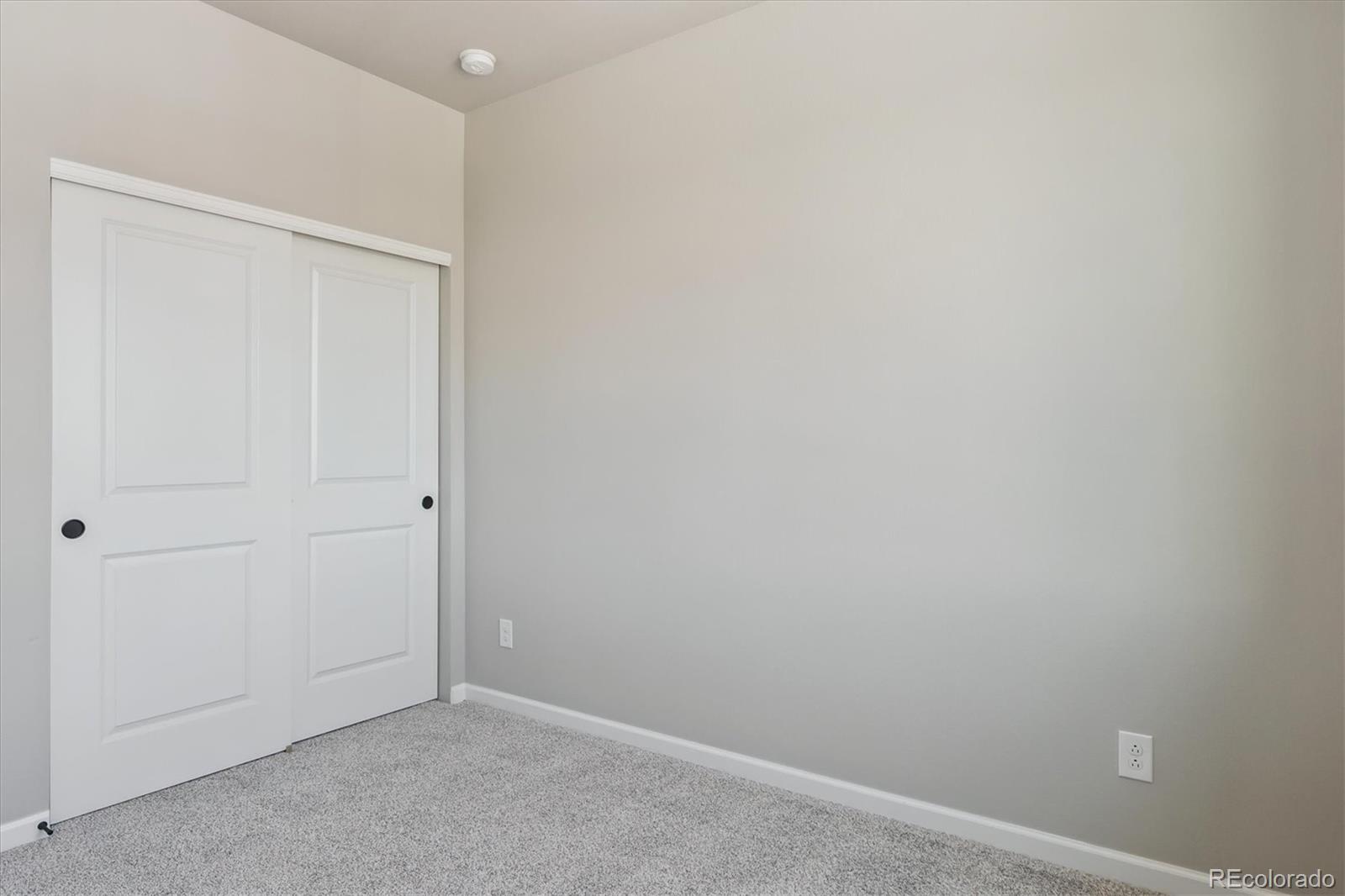 6720 Merseyside Lane Castle Pines, CO 80108 - Photo 19 of 24 a view of an empty room