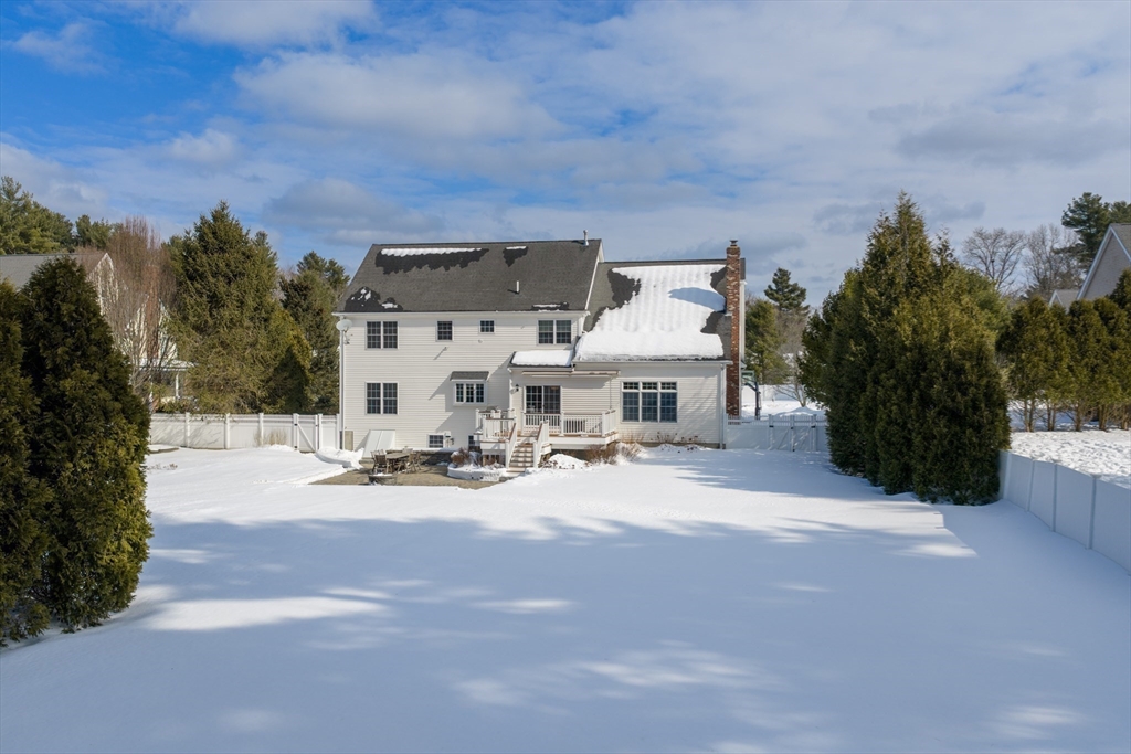 5 Apple Rock Road Millis, MA 02054 - Photo 39 of 42 a view of pool with outdoor seating and house in the background