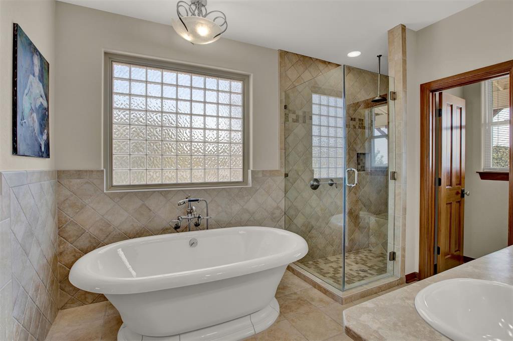 5255 Lookout Ridge Drive Marble Falls, TX 78654 - Photo 12 of 40 Master bath deep tub and separate shower