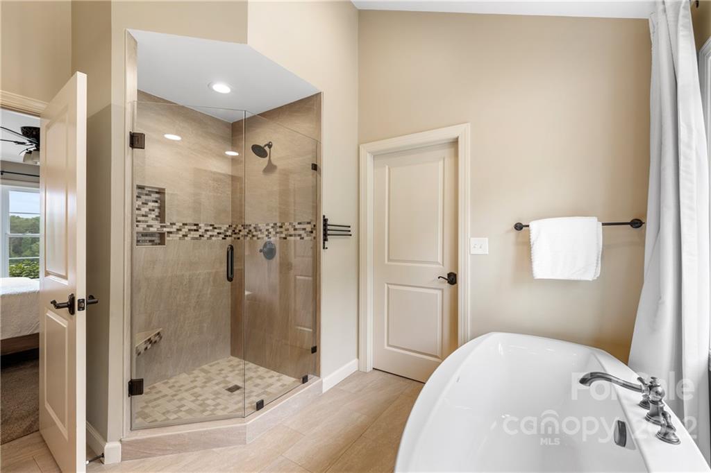 1040 Landrum Mill Road Campobello, SC 29322 - Photo 16 of 39 a bathroom with a sink and shower