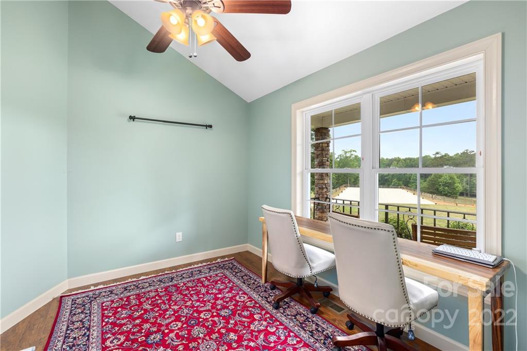 1040 Landrum Mill Road Campobello, SC 29322 - Photo 7 of 39 a view of a workspace with furniture and a window