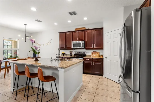 $600,000 | 15058 Sawgrass Bluff Drive, Winter Garden, FL 34787