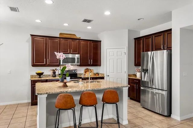 $600,000 | 15058 Sawgrass Bluff Drive, Winter Garden, FL 34787