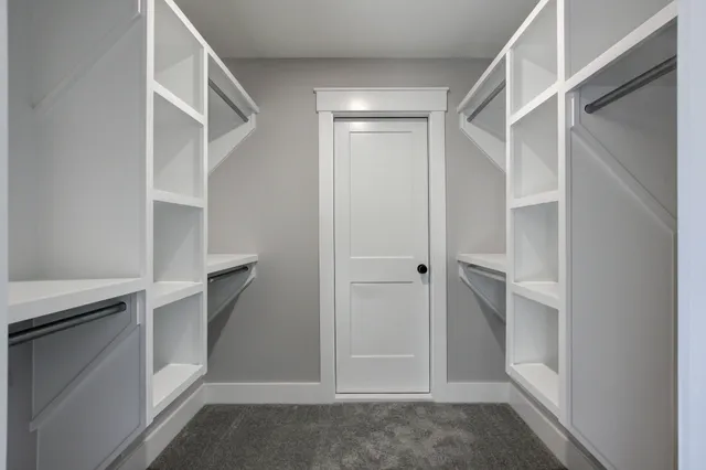 a big room with windows and closet