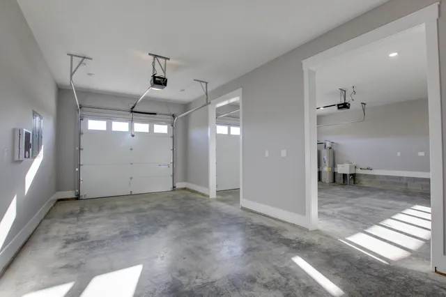 a view of hallway with wooden floor