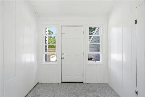 an empty room with windows
