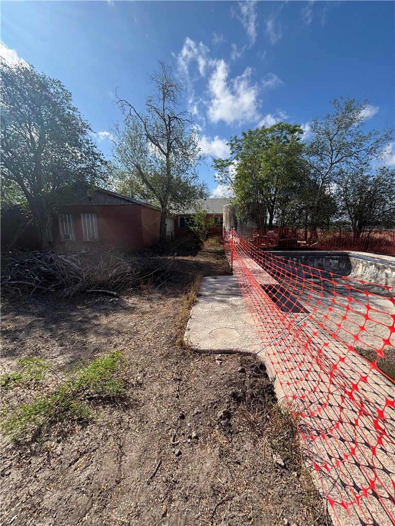 369 Edith Drive Alice, TX 78332 - Photo 11 of 27 a view of a backyard with large trees
