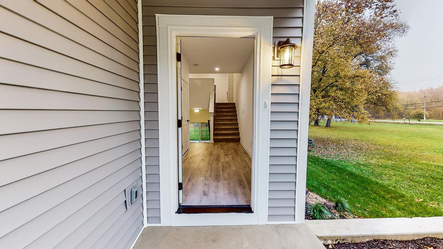 1036 Hwy 330 Griffith In 46319 Griffith, IN 46319 - Photo 3 of 27 a view of a door front of house