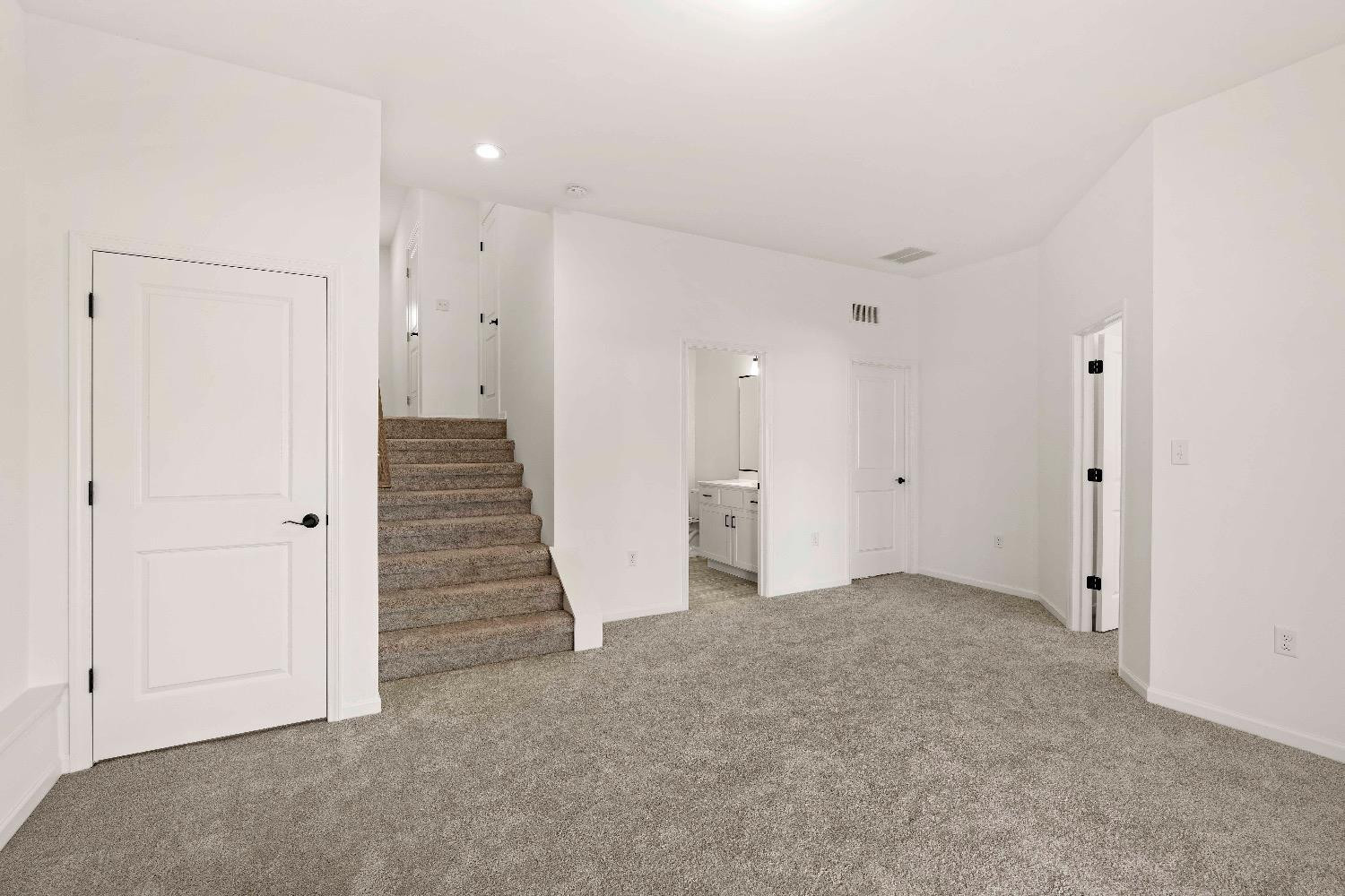 1036 Hwy 330 Griffith In 46319 Griffith, IN 46319 - Photo 10 of 27 an empty room with a hallway and stairs