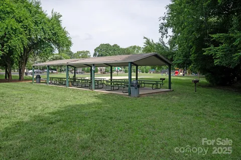 a view of a house with a big yard