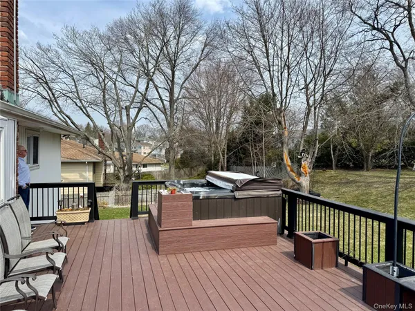 a view of a deck with furniture