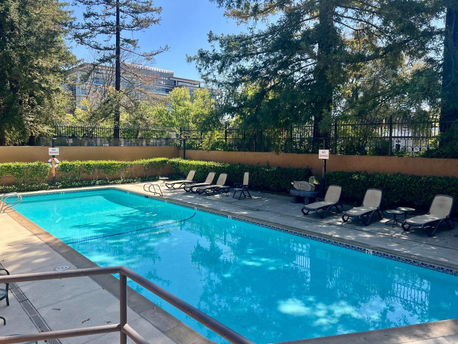 200 P Street, Unit E11 Sacramento, CA 95814 - Photo 20 of 21 a view of a swimming pool with a patio