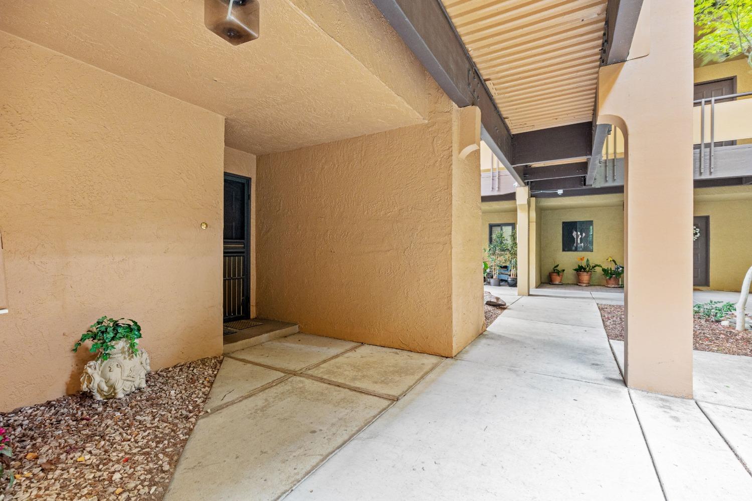 200 P Street, Unit E11 Sacramento, CA 95814 - Photo 3 of 21 a view of a house with a patio