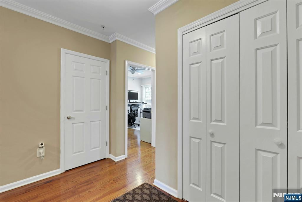 155 The Promenade Edgewater, NJ 07020 - Photo 4 of 31 a view of a livingroom with wooden floor