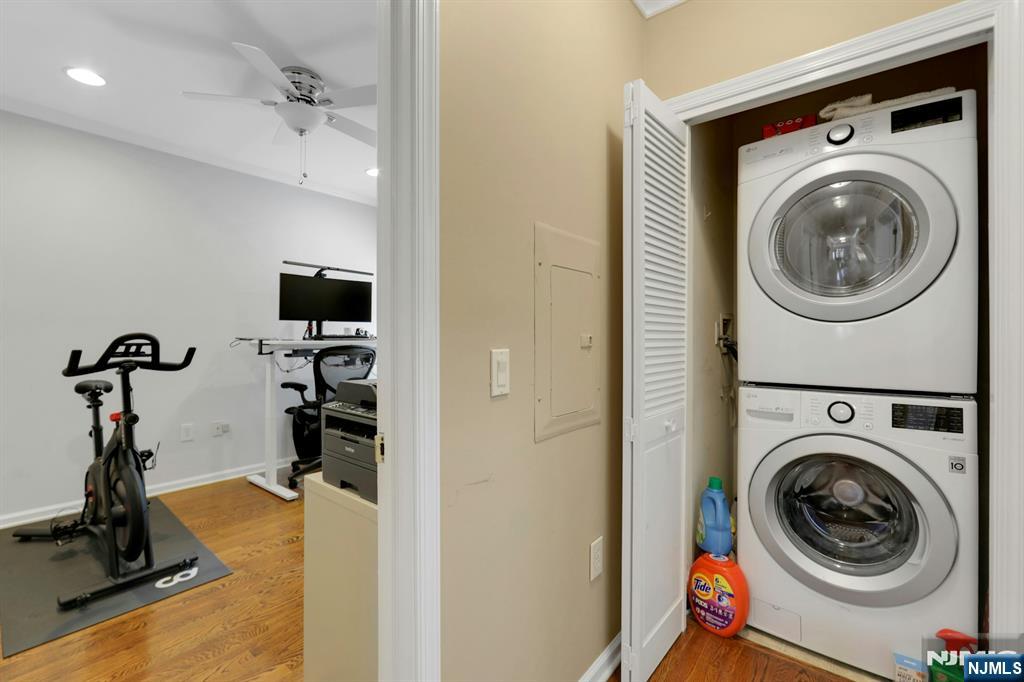 155 The Promenade Edgewater, NJ 07020 - Photo 6 of 31 a view of a room with washer and dryer