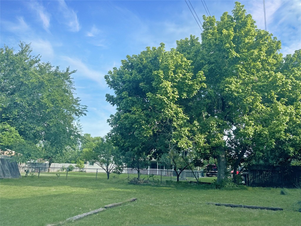 2503 Cecil Drive, Unit C Austin, TX 78744 - Photo 7 of 8 a garden view with a trees