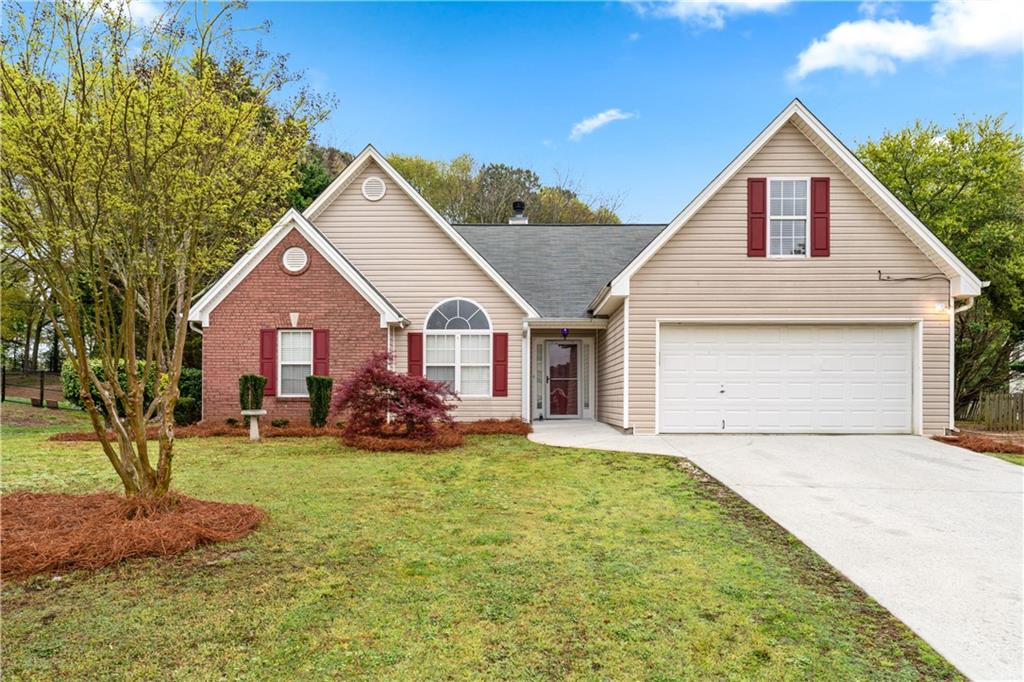 505 Saddle Ridge Drive Bethlehem, GA 30620 - Photo 1 of 1 a view of a house with a yard and pathway