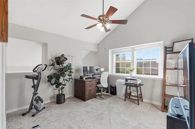 a view of a workspace with furniture