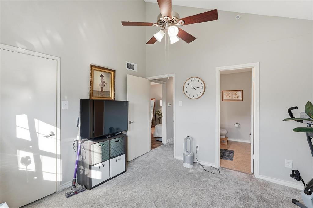 6220 Bentwood Trail, Unit 908 Dallas, TX 75252 - Photo 17 of 40 a living room with furniture a flat screen tv and a window